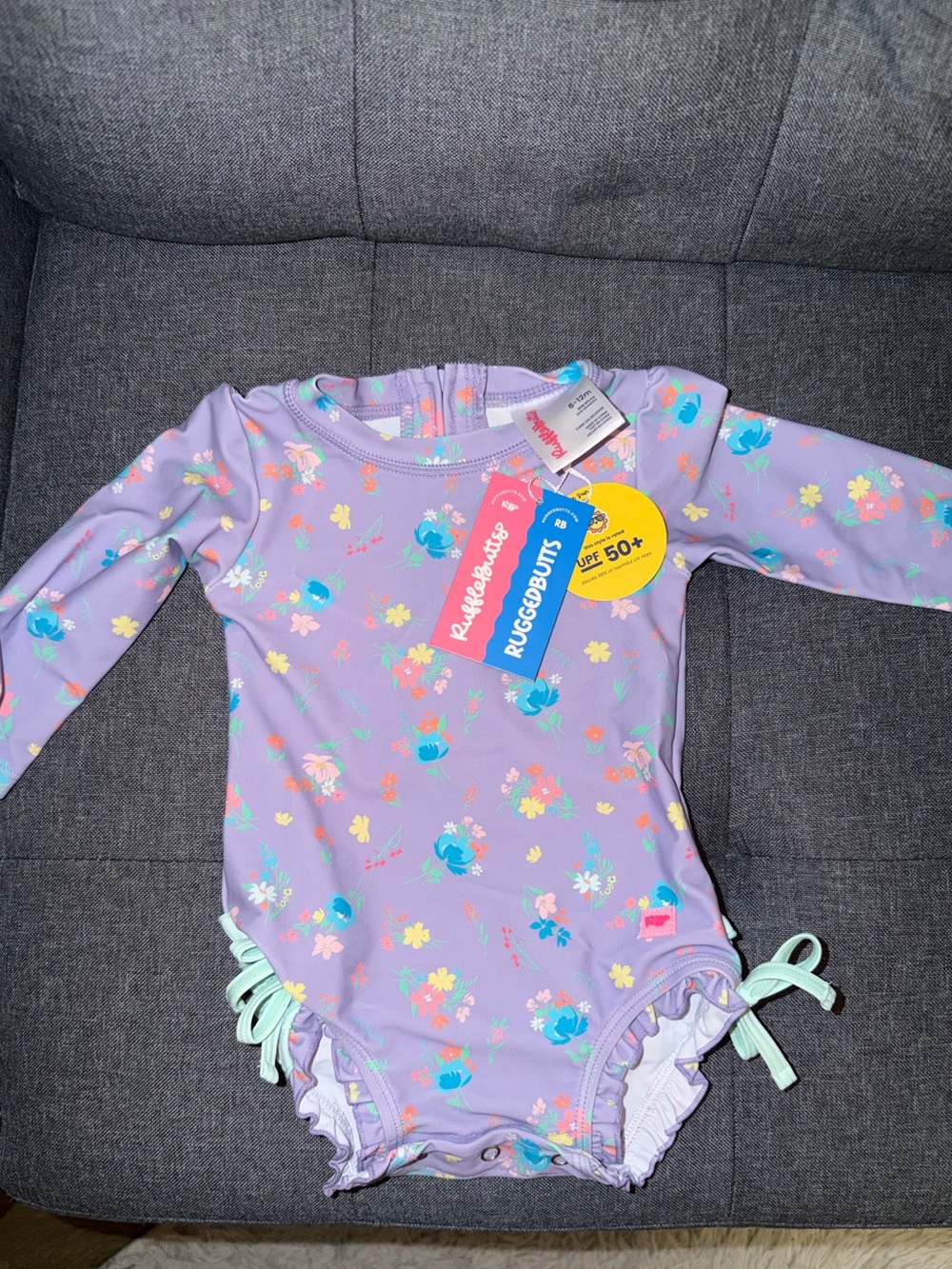 Rufflebutts Lavender Floral Long-Sleeve Sunsuit - UPF 50+